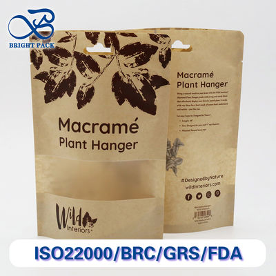 Kantong kertas kraft yang dapat didaur ulang dan terdegradasi dengan jendela transparan untuk kemasan produk sehari-hari dengan pencetakan khusus.